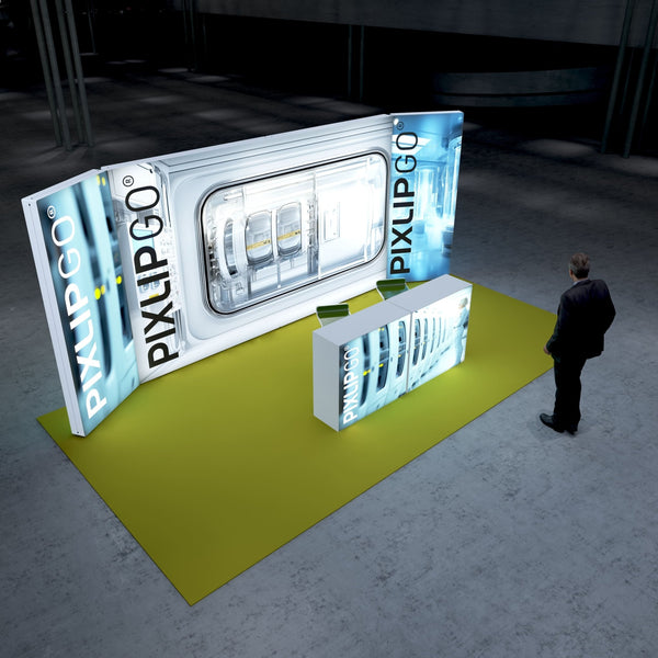 A modern exhibition stand featuring illuminated PIXLIP GO advertising displays showcasing an advanced device with a futuristic design. The stand is set on a bright yellow carpet, drawing attention to the central area.