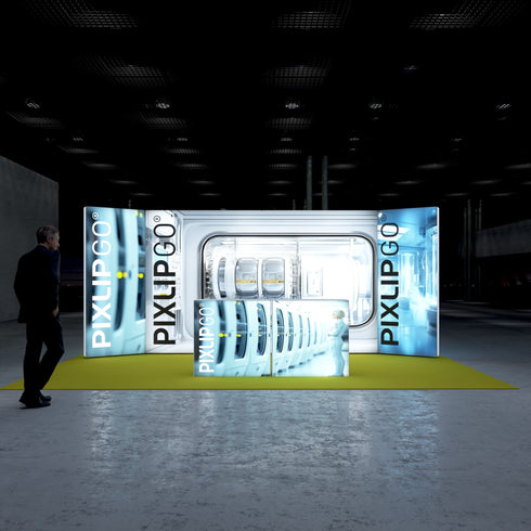 A front view of the exhibition stand. The displays feature a sleek and modern technical theme focused on a high-tech product in a sterile, futuristic environment. The yellow carpet provides a strong contrast to the predominantly white and blue color scheme.