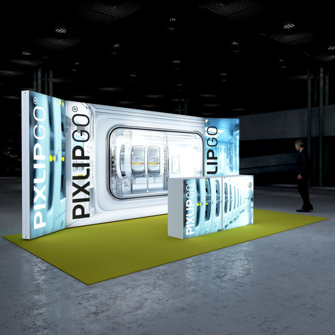 A side view of the exhibition stand, highlighting the depth of the illuminated displays. The combination of vibrant colors and modern design conveys a professional and forward-thinking image. A man stands in front of the stand, observing the presentation.