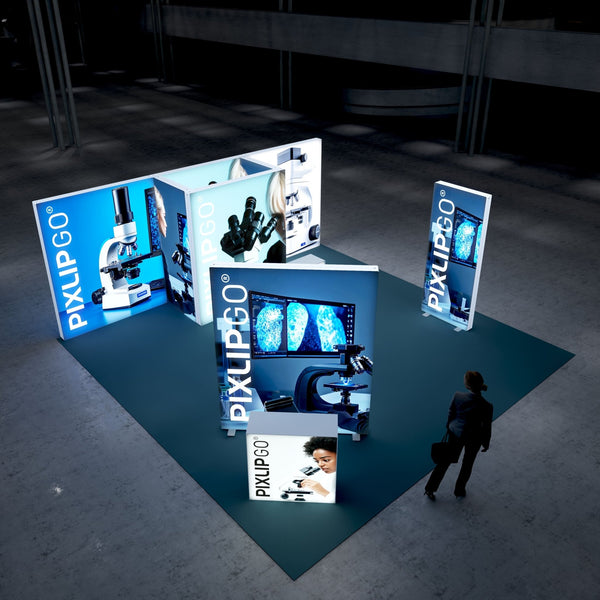 Exhibition booth with a science and microscopy theme, featuring bright blue illuminated displays of microscopes and close-up images of microscopic samples. A professional woman is viewing the setup on a blue floor.