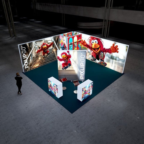 A bird’s-eye view of a lively exhibition booth. The setup features multiple illuminated panels with dynamic images of a red character skateboarding, surrounded by colorful skateboards and vibrant action-themed displays. The deep teal flooring adds contrast and depth to the vibrant design.